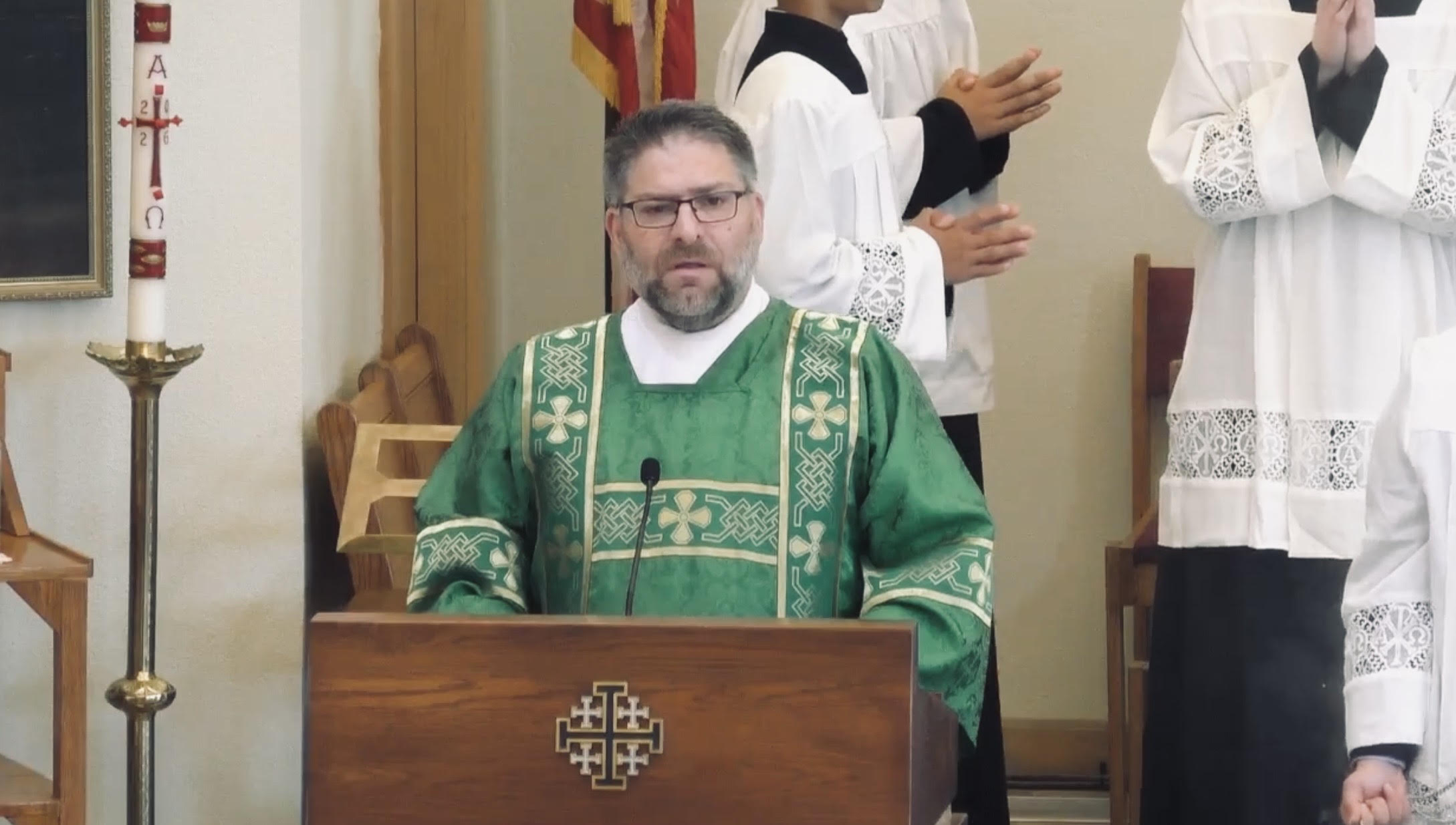 Mark Tahsler serving as a deacon at St. Catherine of Siena Catholic Church